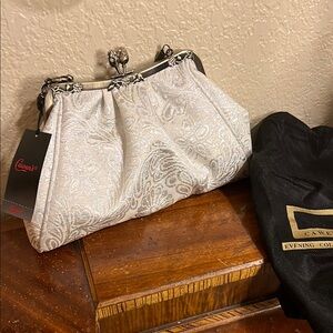 🔥Shimmering White/Silver Clutch with Ornate Clasp and Textured Design NWT